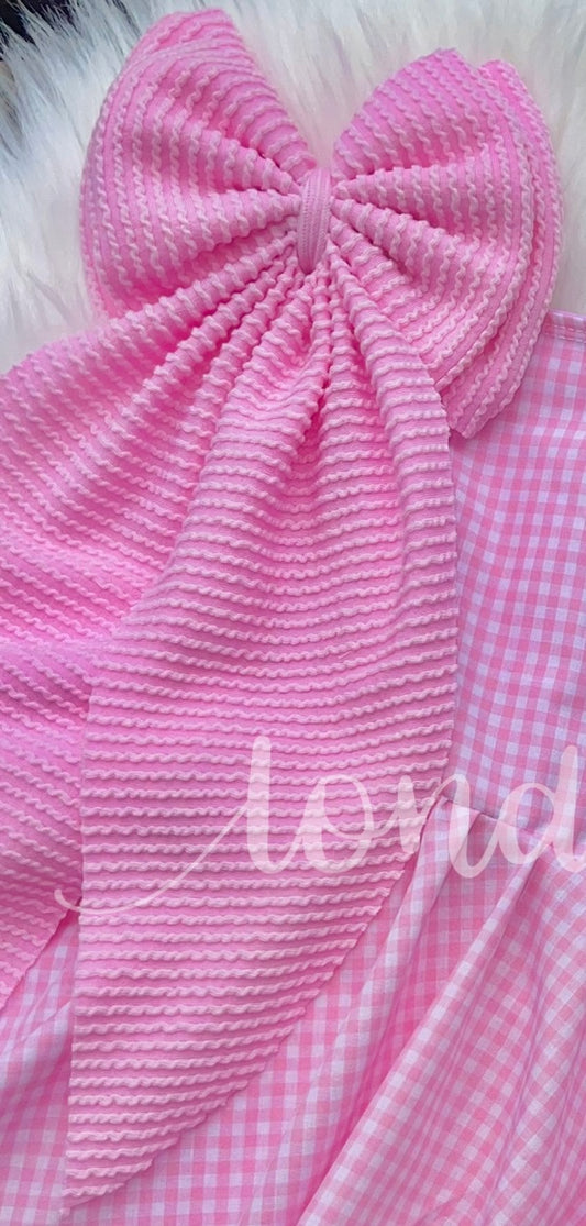 Coquette pink waved clip bow
