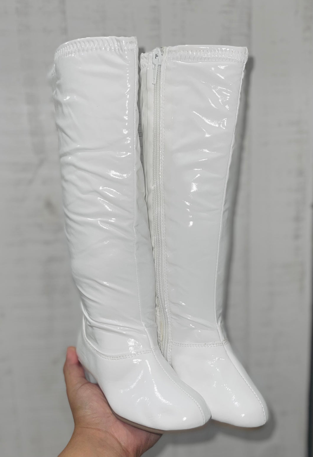 White knee high boots