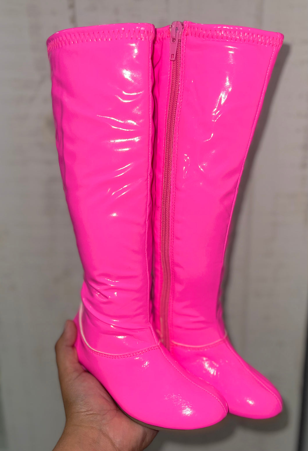 Pink knee high boots