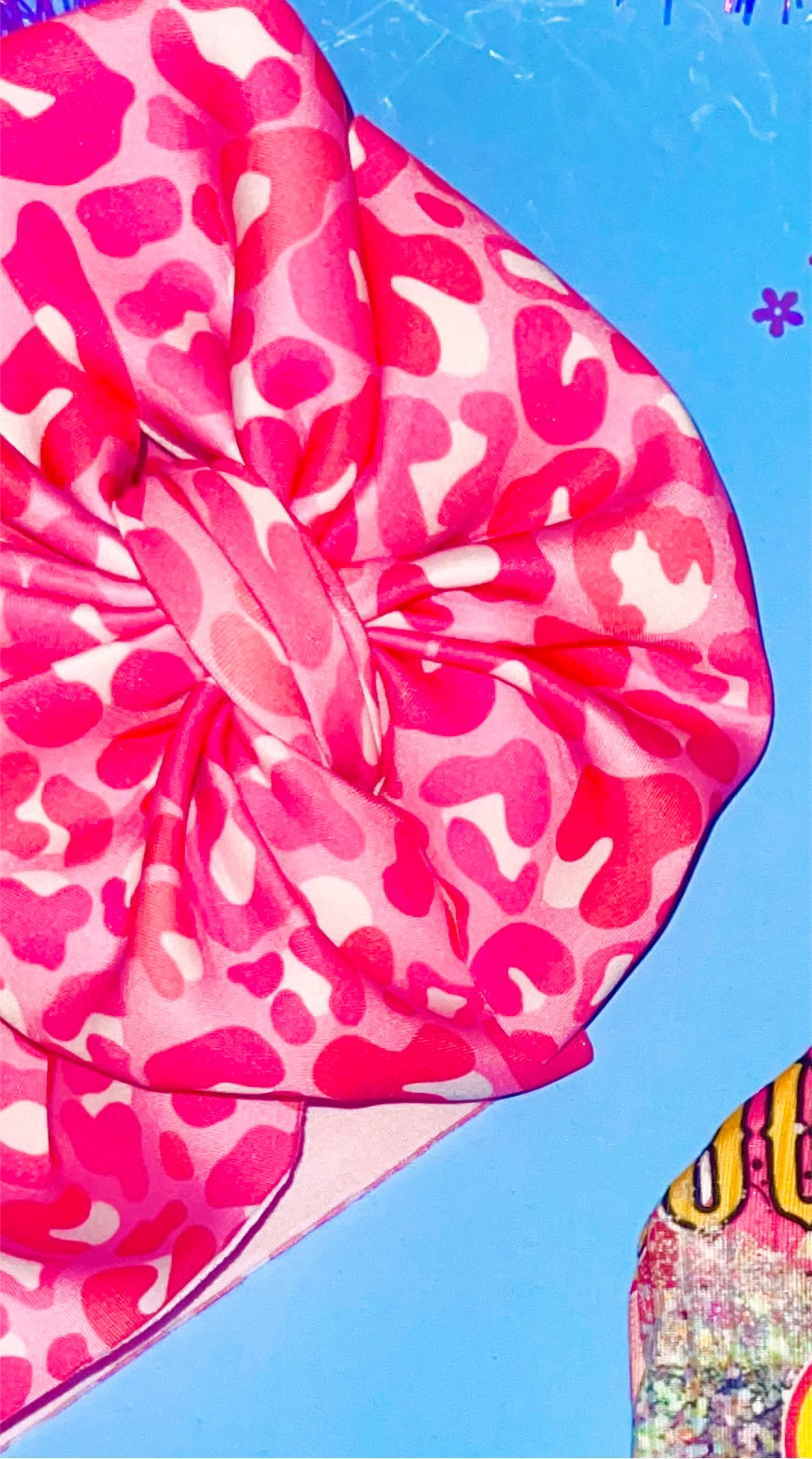 Pink cheetah scuba bows